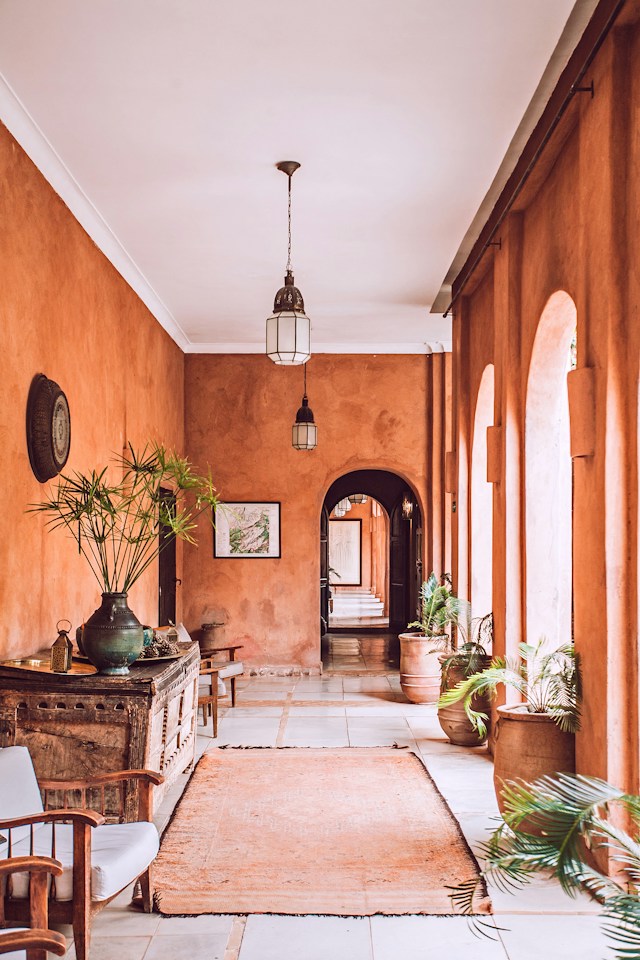 Terracotta hallway with arched doorways