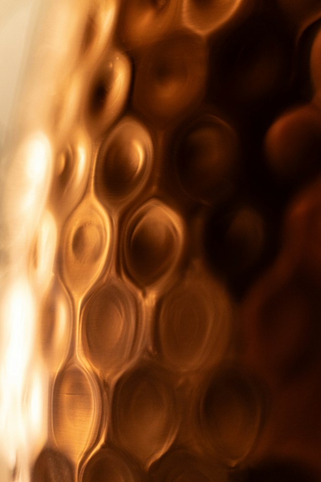 Hammered copper surface