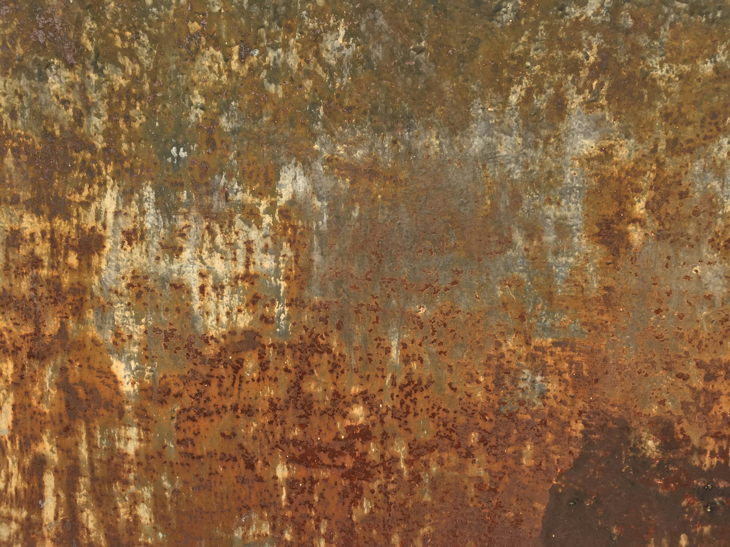 Weathered rust and amber metal texture